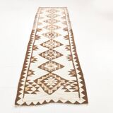 Tapis kilim ancien en laine – style bohème, motifs ethniques sur fond clair