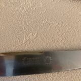 Complete set of 12 stainless steel table knives with Bakelite handles and Art Deco ferrules