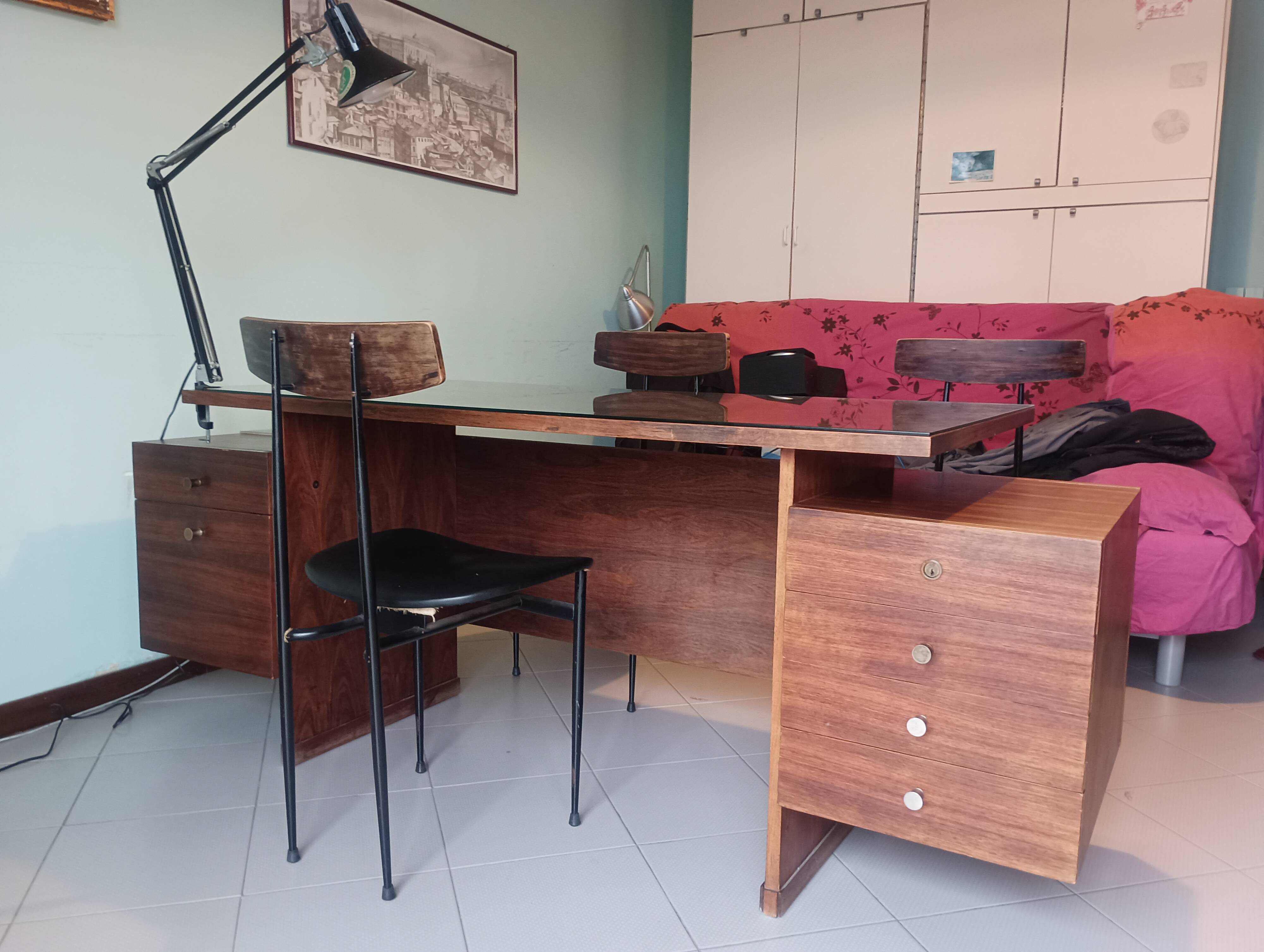 Desk and 3 chairs in 1950s Italian modernist style in rosewood.
