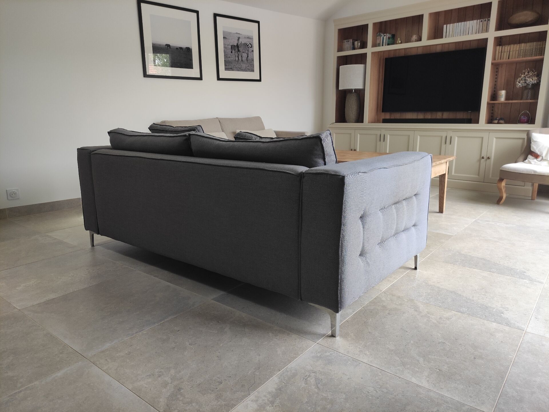 Three-seater grey mottled fabric sofa