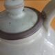 Vintage artisanal style glazed pottery teapot