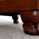 Neo-classical pedestal table in walnut and black marble - French work from the 1930s