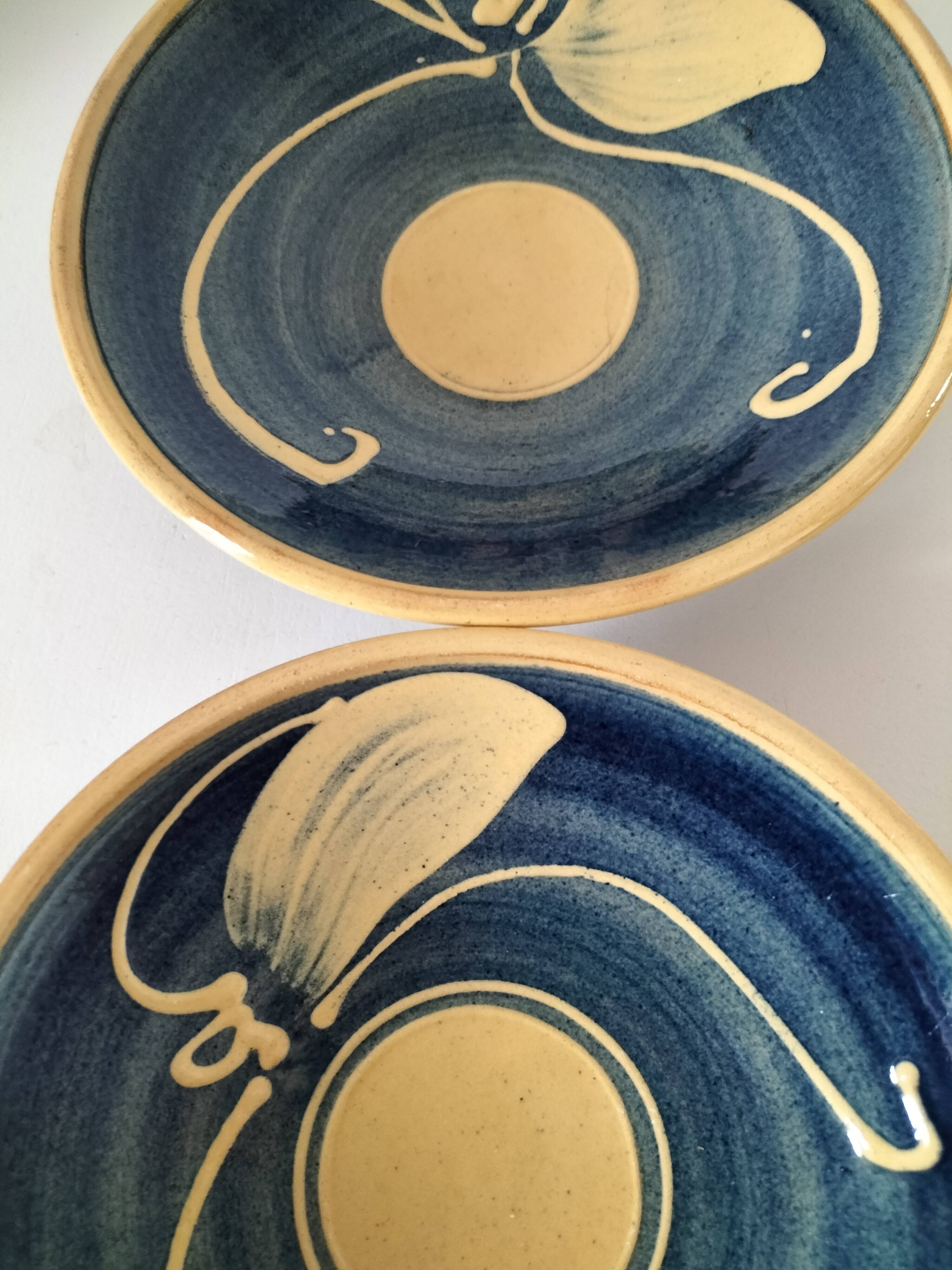 Pair of handcrafted bowls by Le Fer Rouge with blue and beige decor