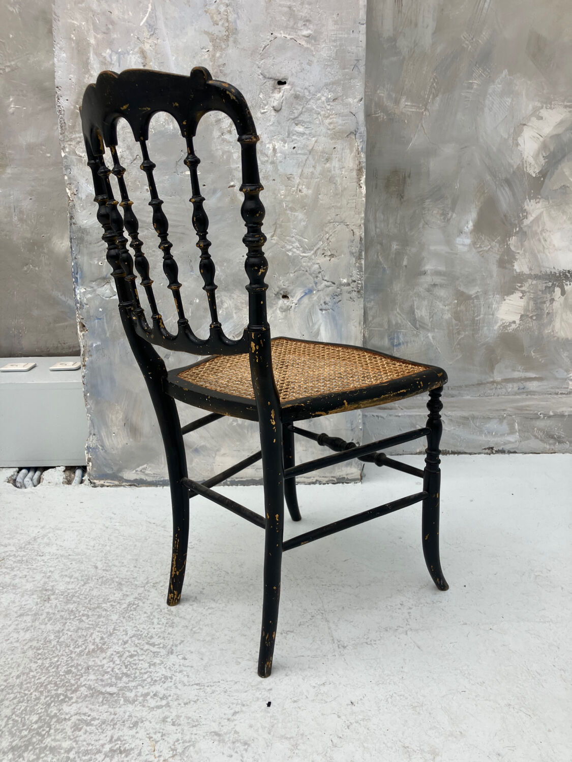 Napoleon III chair in blackened wood and cane