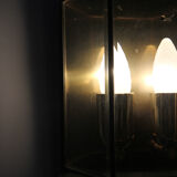 Wall sconce in brass and glass