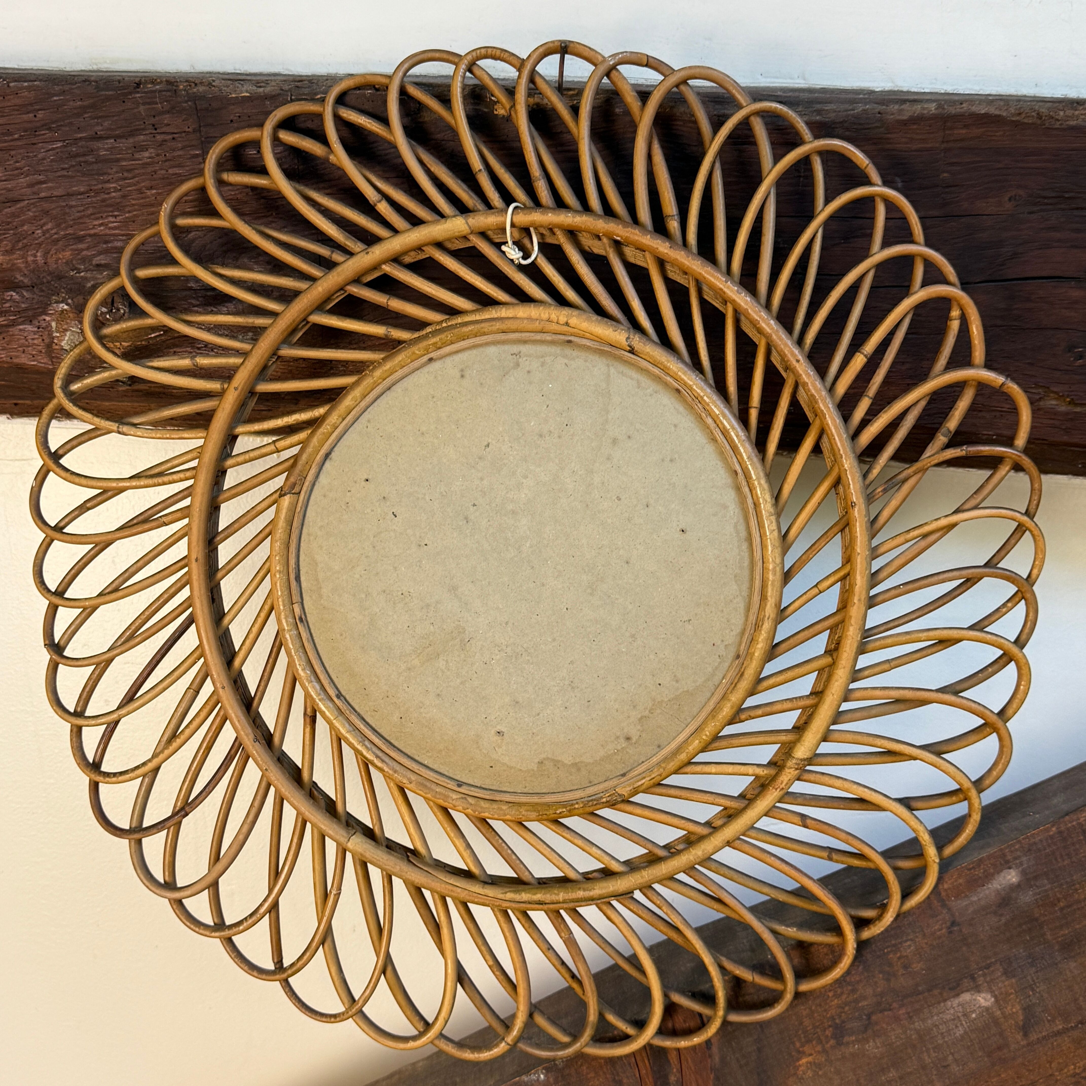 Round rattan mirror from the 1950s France