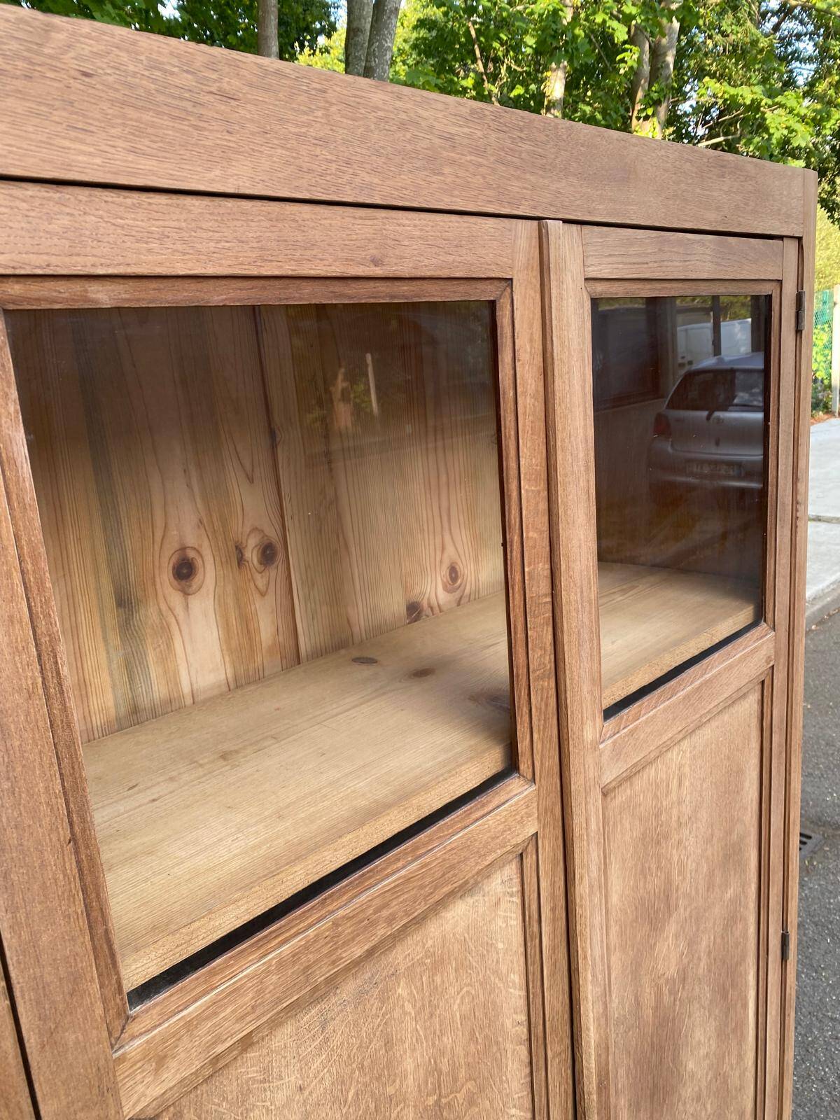 Parisian bonnetière cabinet, stripped display in solid oak from the 1930s.