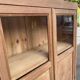 Parisian bonnetière cabinet, stripped display in solid oak from the 1930s.