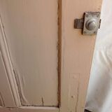 Old glazed door with its shutter