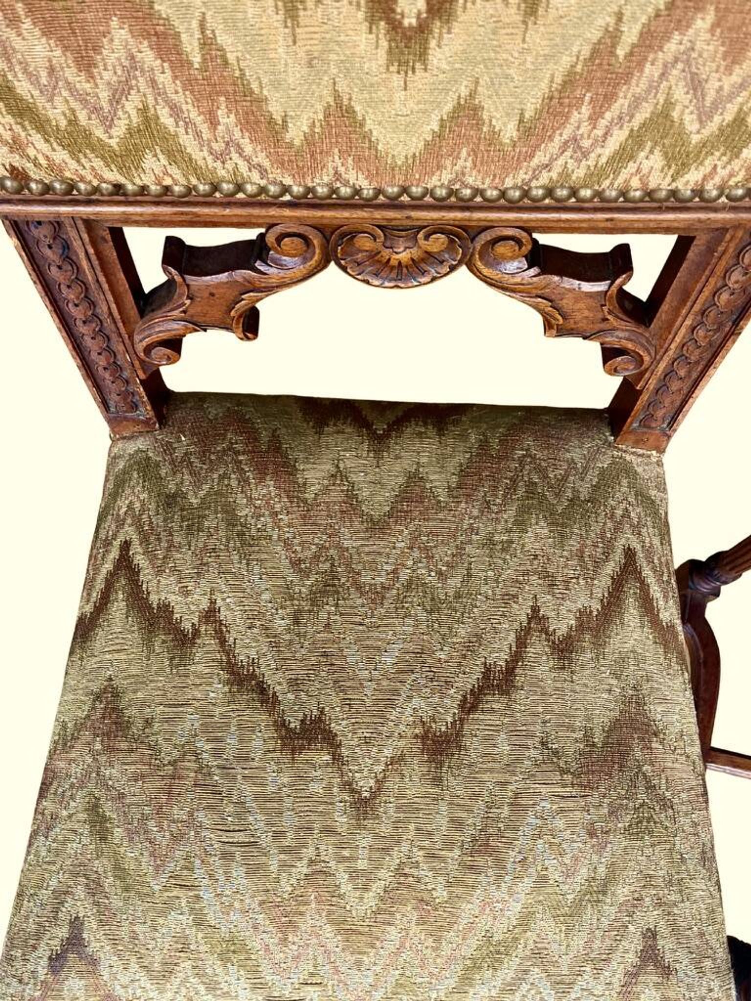 Pair of dining chairs, pair of carved Gothic chairs, set of Renaissance chairs.