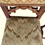 Pair of dining chairs, pair of carved Gothic chairs, set of Renaissance chairs.