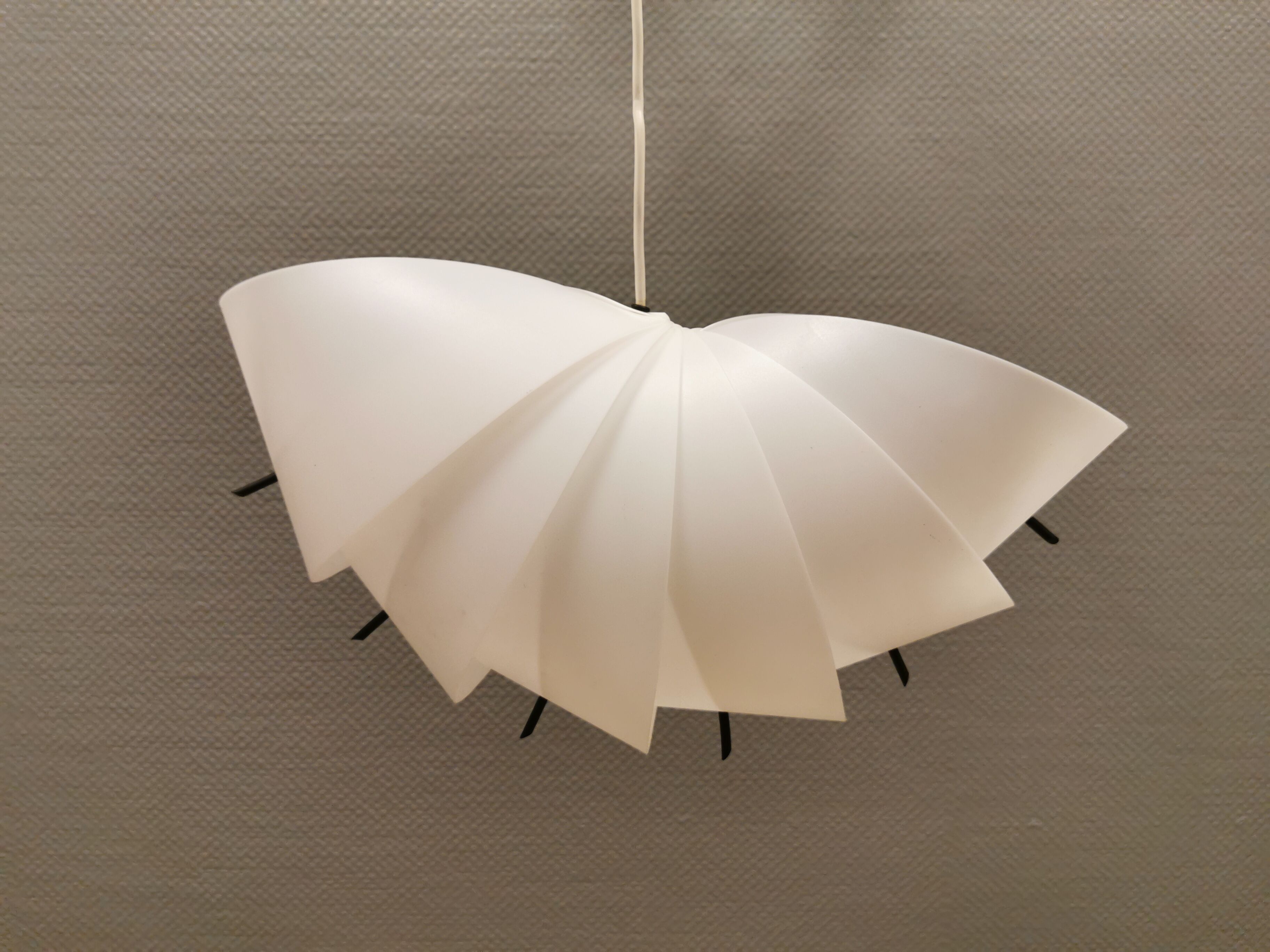 Danish conch, snail shell hanging lamp from the 80s, made of hard ABS plastic.