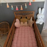 Rattan baby bed and vintage wood