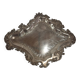 Old small silver-plated tray with a design of scrolls and leaves.