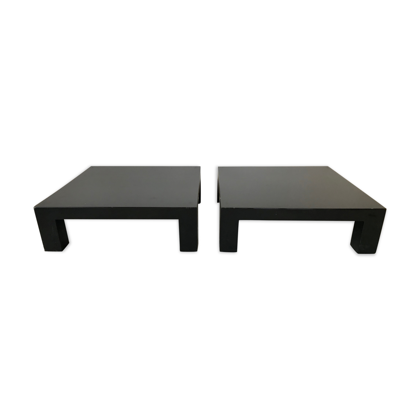 Pair of black laqué wood coffee tables, circa 1970.