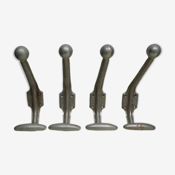 Four industrial iron hooks