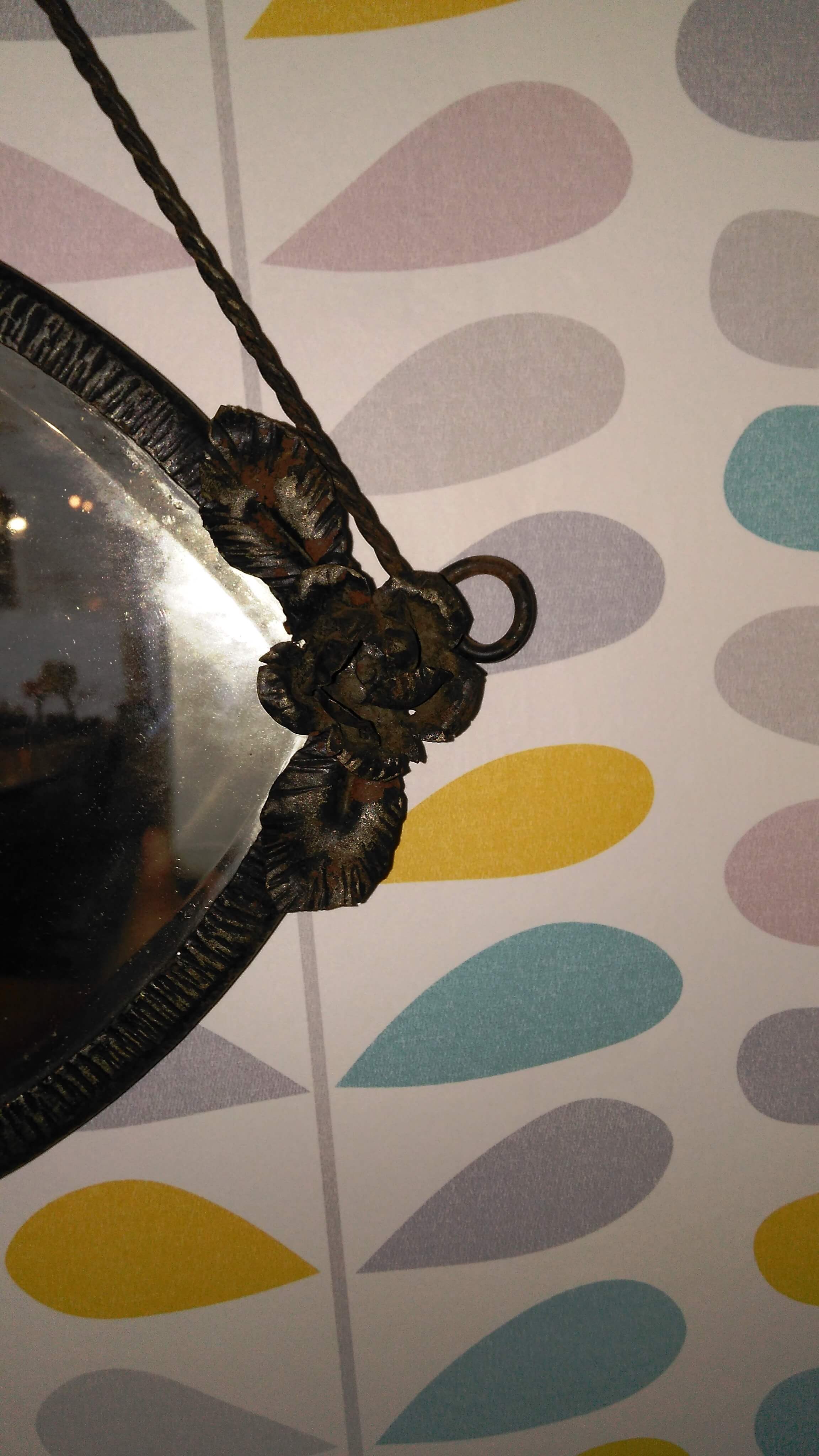 Mirror bevelled iron decorated roses 42x61cm