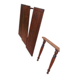 Round pine table with three extensions.