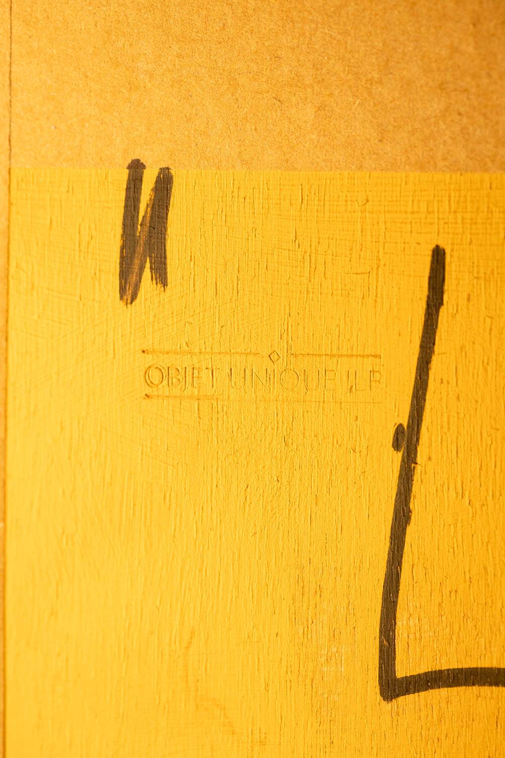 “The Twins”, bas-relief framed in oak wood and patinated copper.