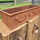 Rusty cast iron jardiniere planter