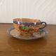 Coffee cup and under cup or tea made of iridescent Japanese porcelain
