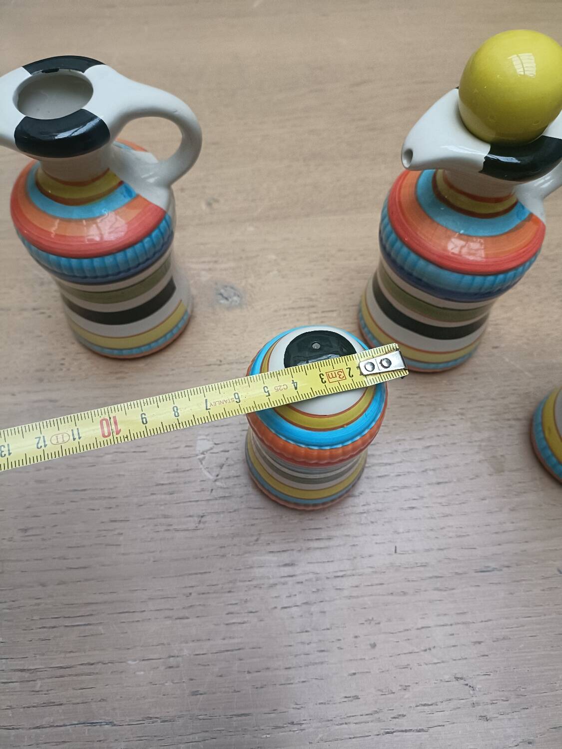Vinegar and oil set, salt shaker and pepper shaker.