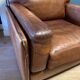 Ensemble de deux fauteuils en cuir de buffle.