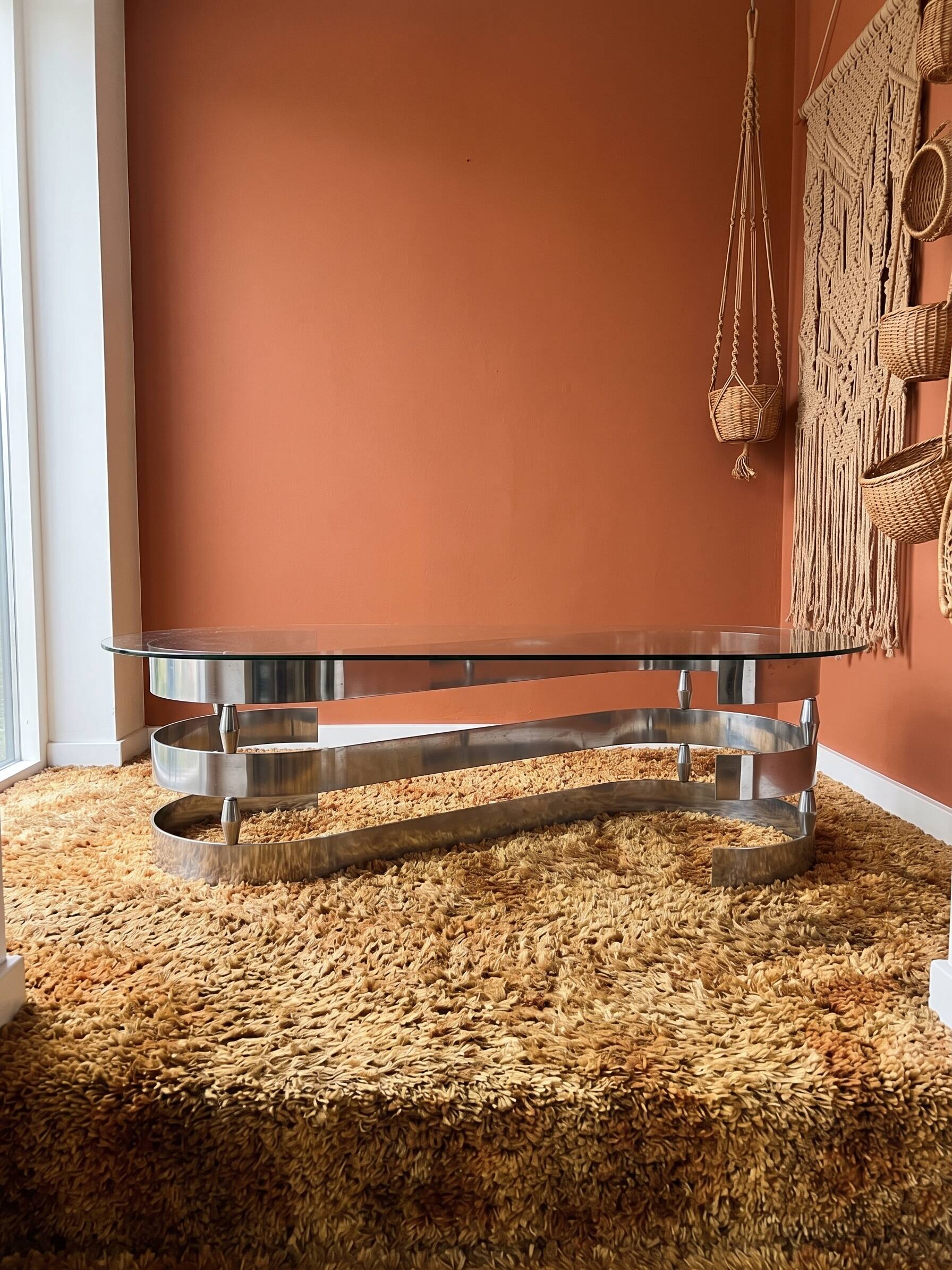 70s oval design coffee table in glass with chrome S legs.