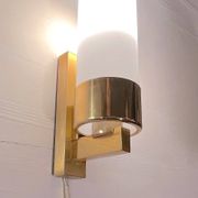 Set of three brass and opaline sconces, mid-century France