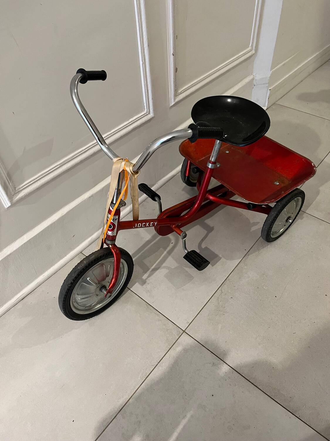 Vintage metal jockey tricycle