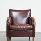 Subtle sheep leather armchair with a beautiful finish and a good patina