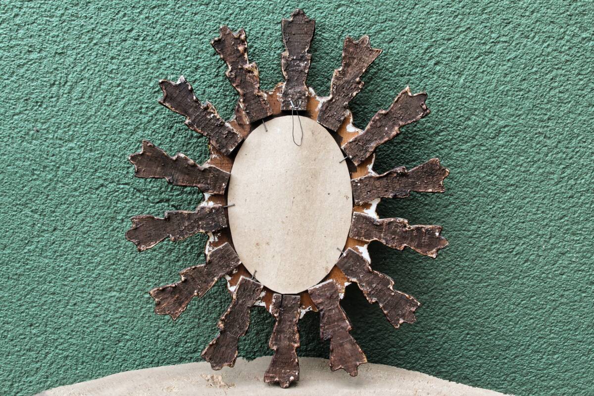 Sun mirror with parecloses, carved wood