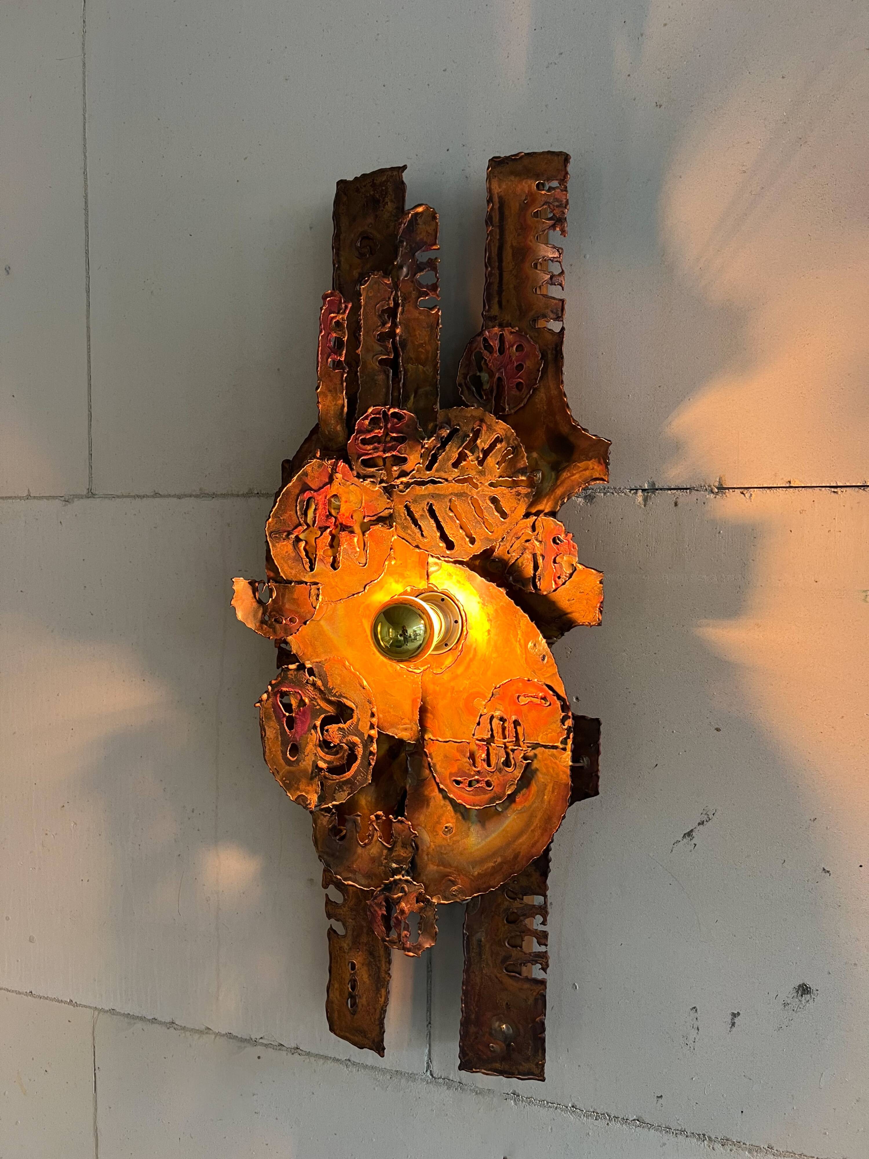 Raw expressive wall sconces by Francesco Pasinato