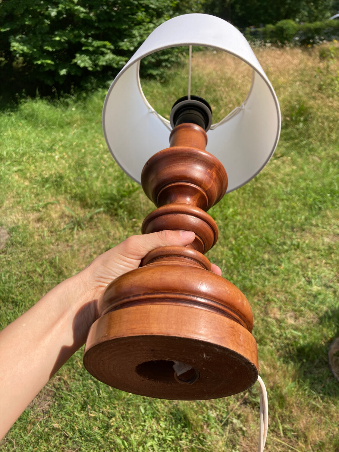 Vintage turned wooden lamp and white lampshade