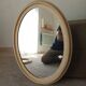 Miroir ovale vintage en bois patiné