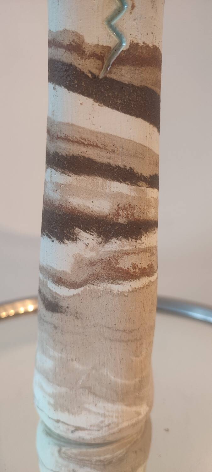Turned stoneware vase signed with relief decoration.