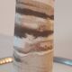 Turned stoneware vase signed with relief decoration.