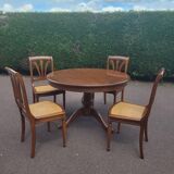 Meurisier table with chairs.
