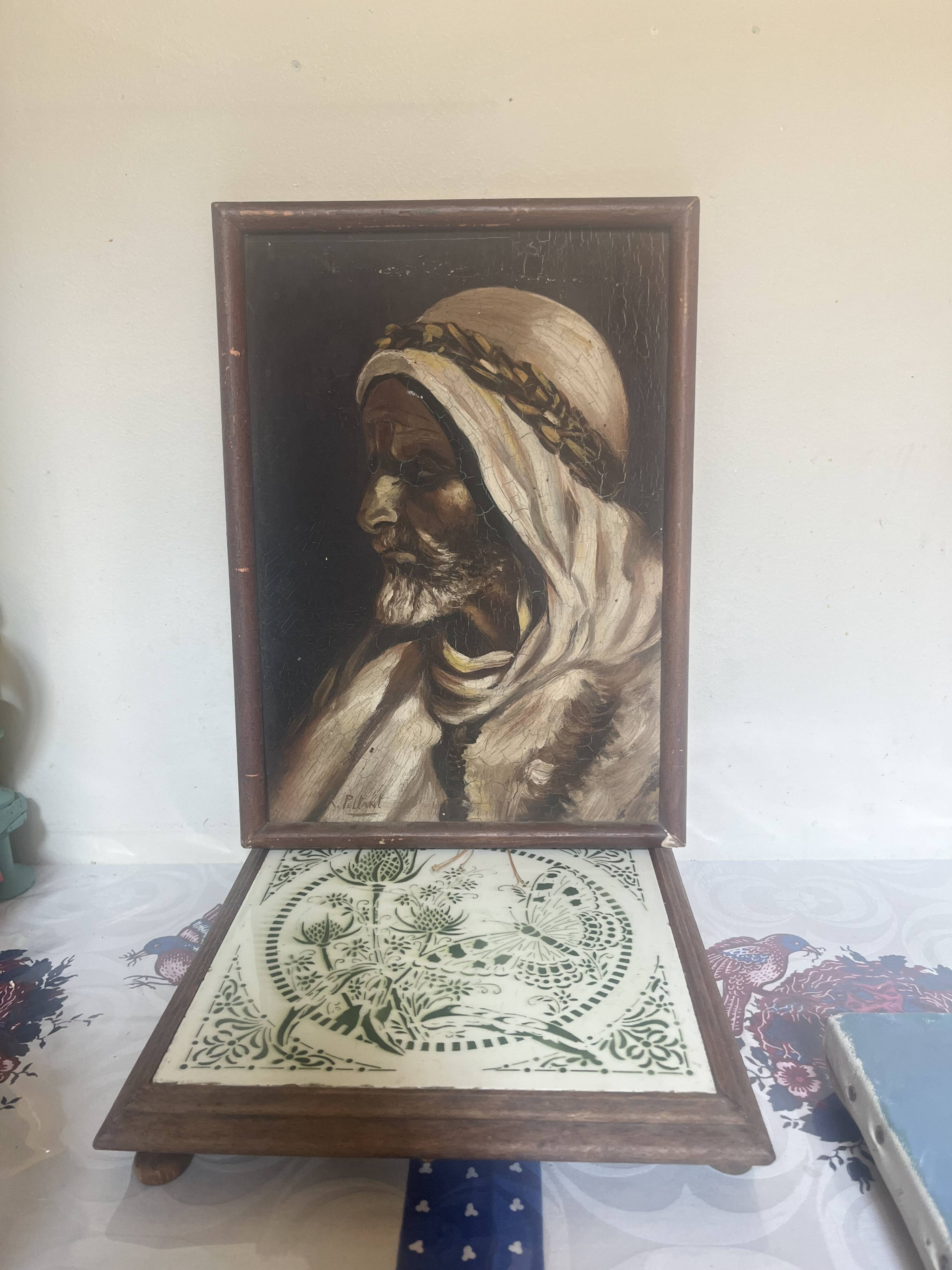 Orientalist painting of an Arab man.