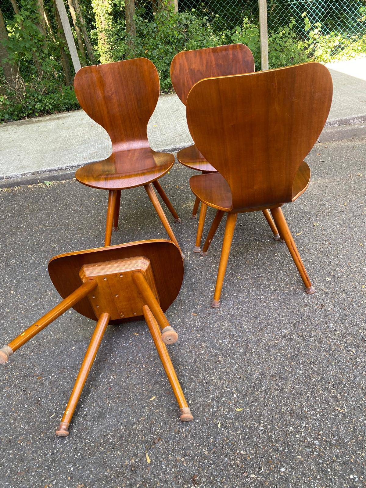 4 vintage Scandinavian dining chairs in curved walnut.