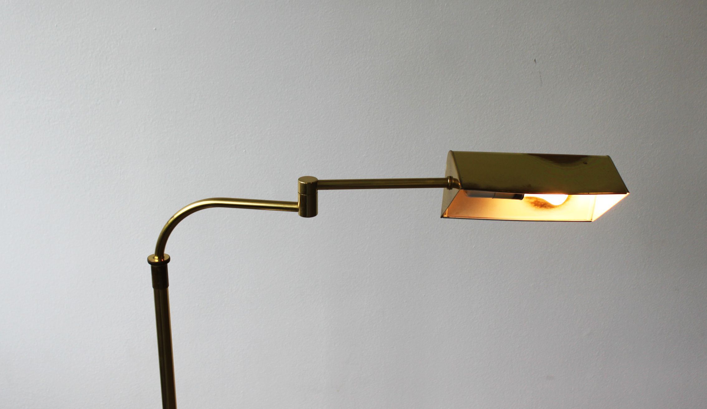 Gilded brass articulated reading light, France, 70's.
