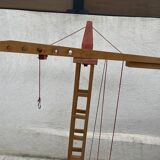 Vintage wooden crane toy from the 60s