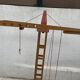 Vintage wooden crane toy from the 60s