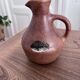 Vintage brown ceramic pitcher signed Max Idlas.