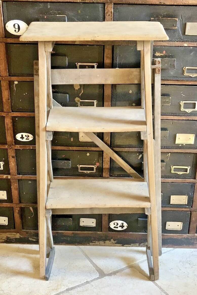 Old small painter's stepladder, wooden trade furniture, step stool