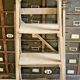 Old small painter's stepladder, wooden trade furniture, step stool