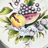 Decorative earthenware and pewter wall plate with fruits