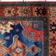 Vintage 1950s German tribal style wool rug, geometric medallion, 84cm x 180cm