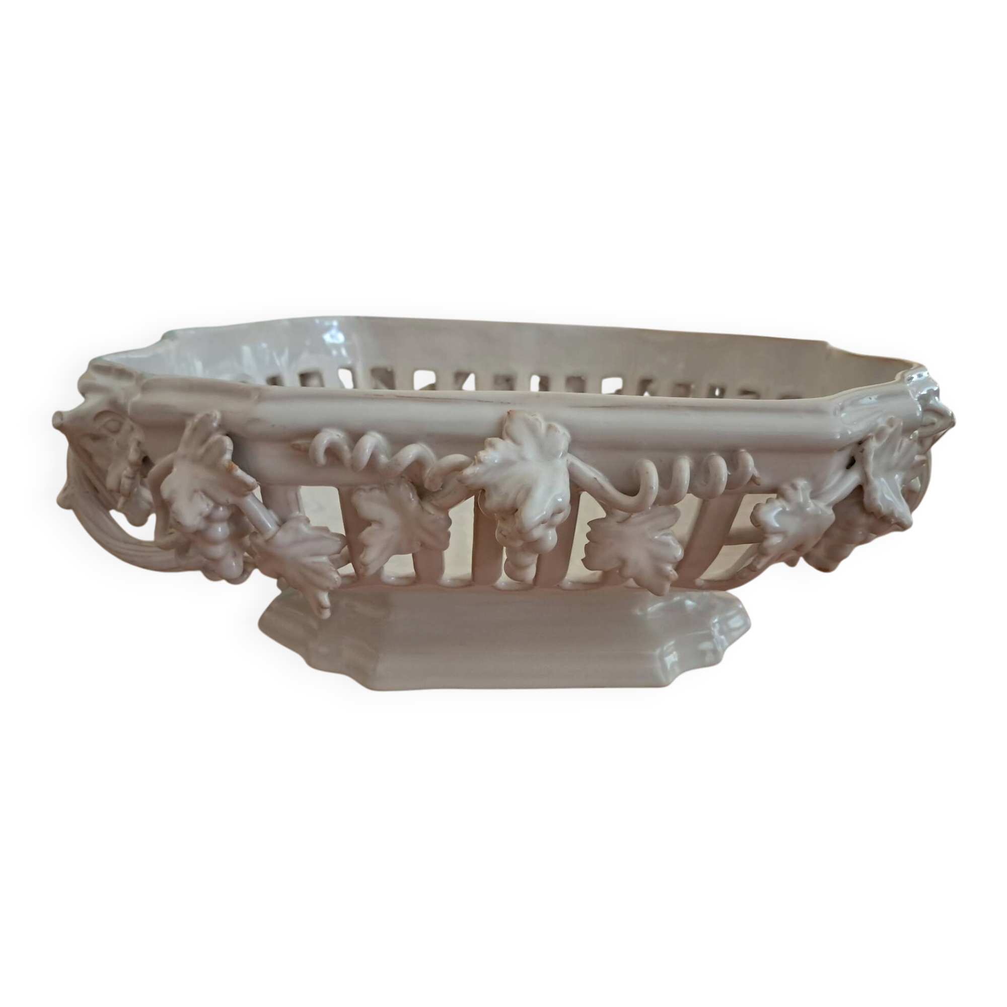 Malicorne fruit bowl in white pierced faience with monogram TE.
