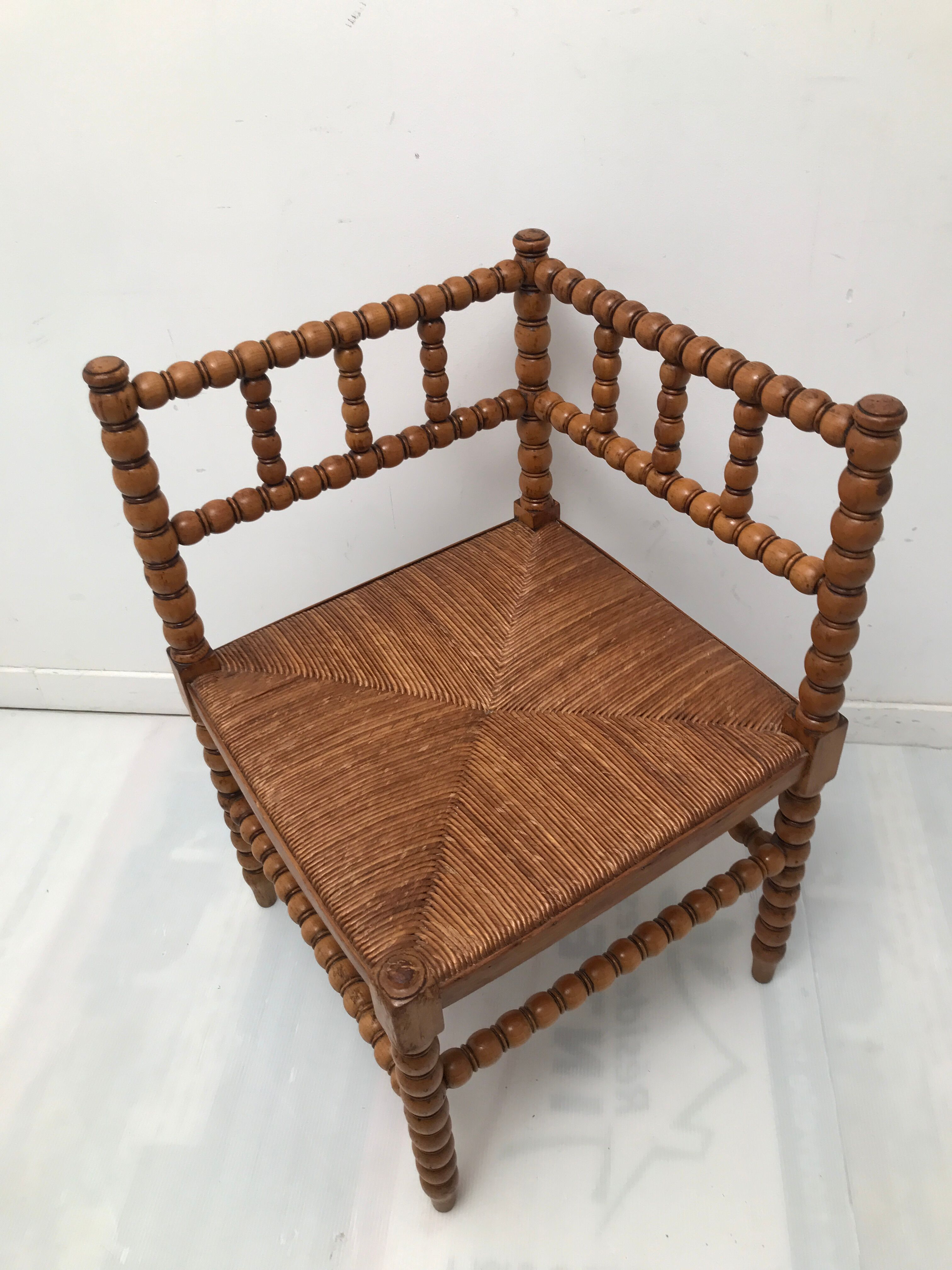 A wooden corner chair turned 1920s